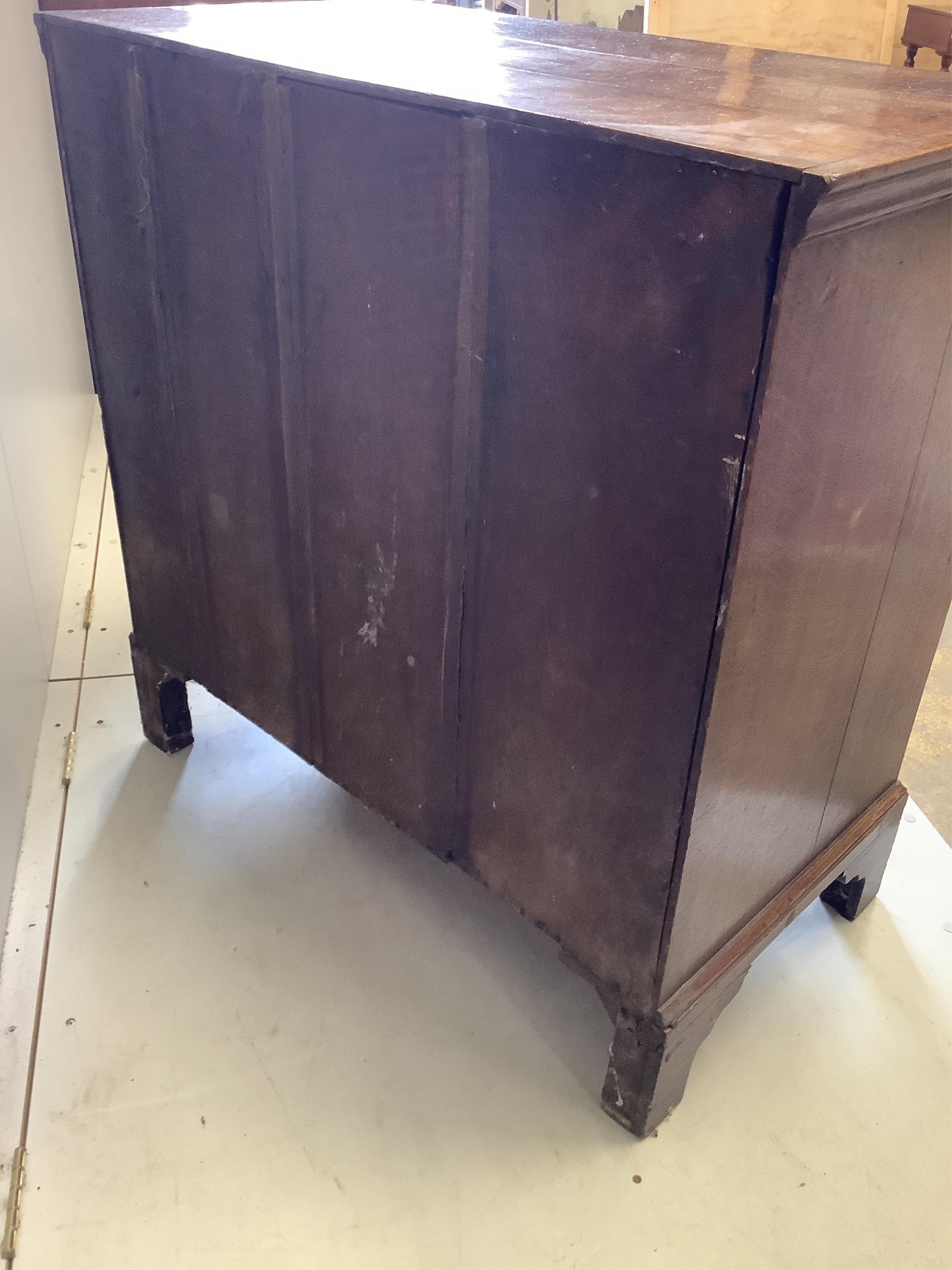 A mid 18th century oak chest, fitted with two short and three long drawers, width 93cm, depth 50cm, height 94cm. Condition - fair